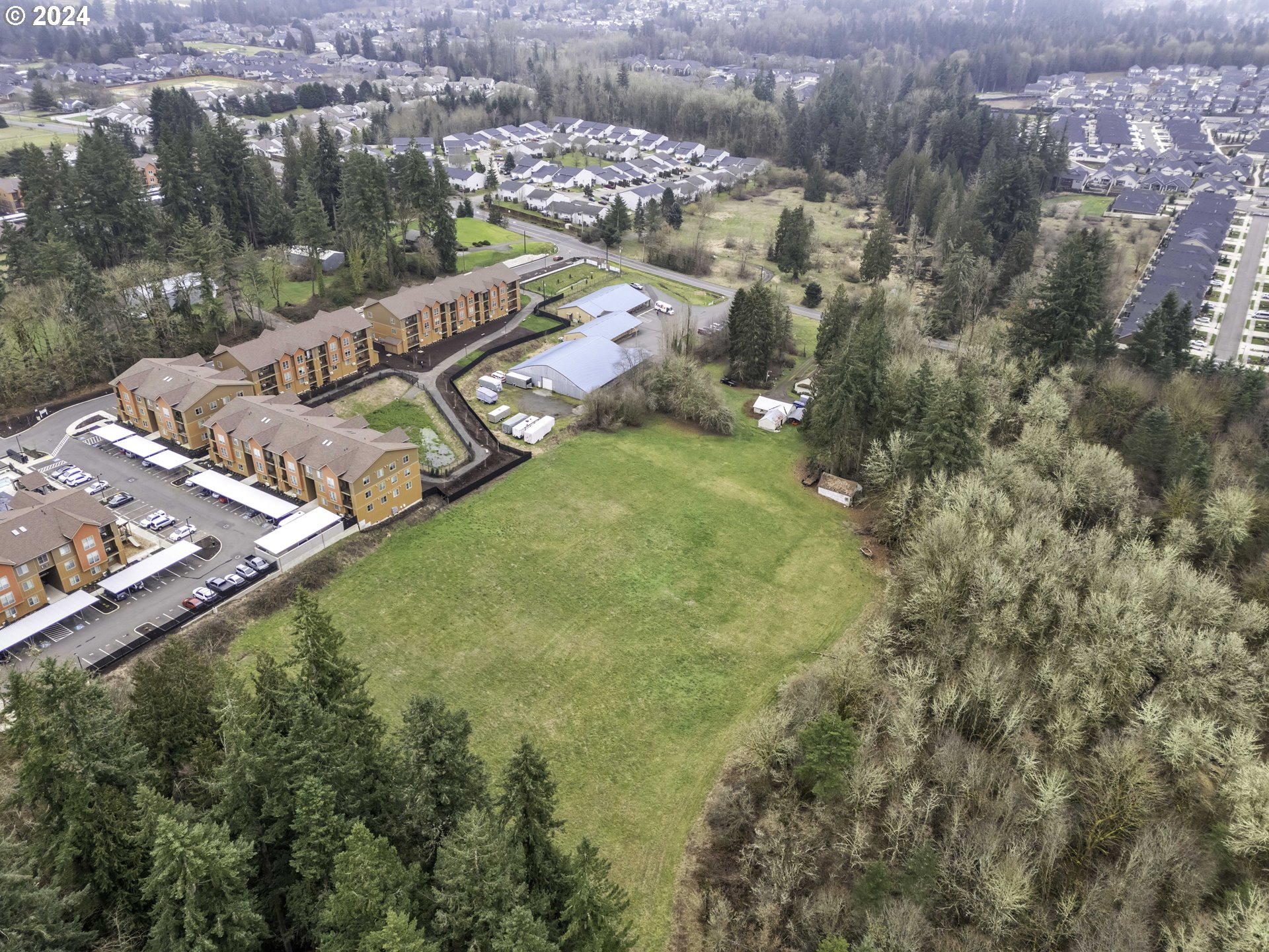 1804 Northeast 179th Street Ridgefield, WA 98642 - Photo 1 of 12 a view of a city from a yard