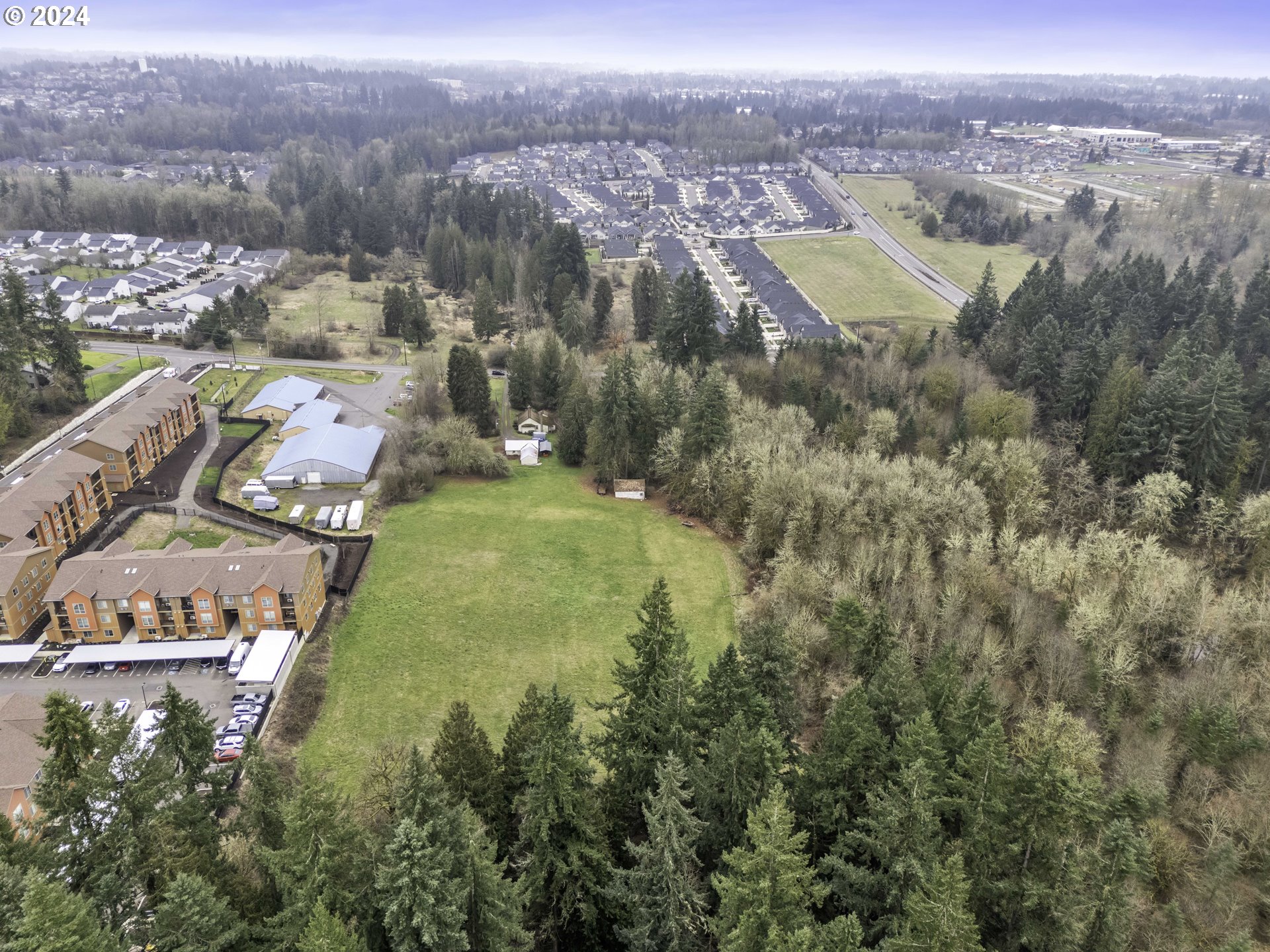 1804 Northeast 179th Street Ridgefield, WA 98642 - Photo 2 of 12 an aerial view of a house with a yard