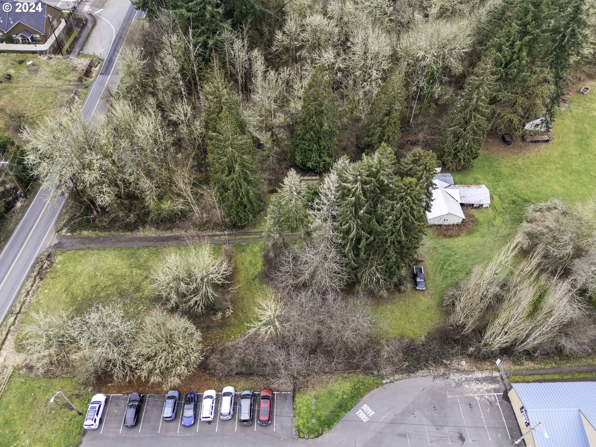 1804 Northeast 179th Street Ridgefield, WA 98642 - Photo 5 of 12 a backyard of a house with a yard and outdoor seating