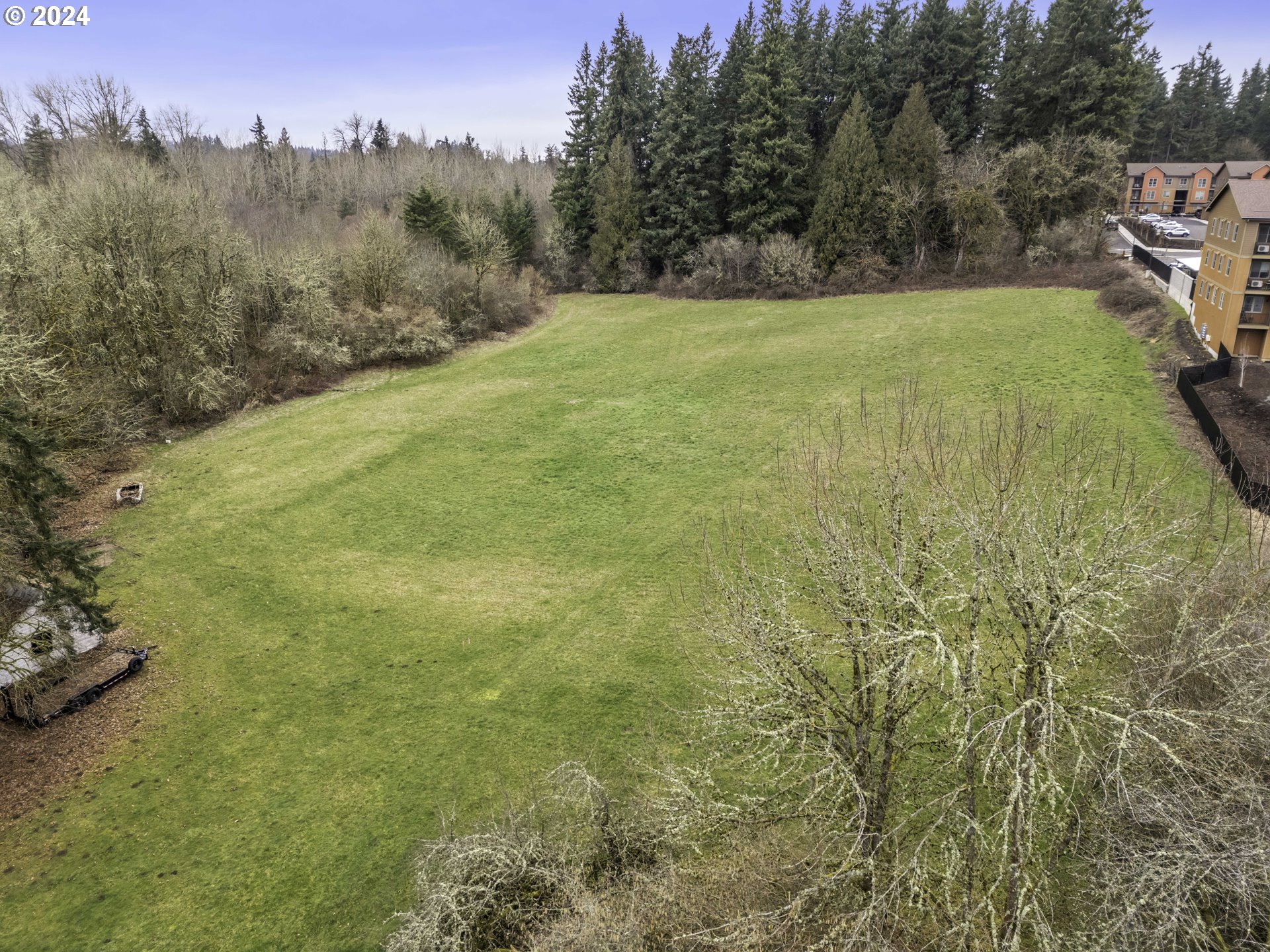 1804 Northeast 179th Street Ridgefield, WA 98642 - Photo 7 of 12 a view of a yard with an trees