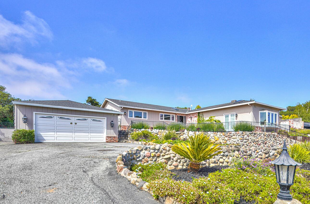 15265 Charter Oak Boulevard Prunedale, CA 93907 - Photo 1 of 44 a front view of a house with a yard