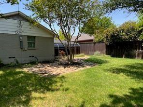 8926 Angleton Place Dallas, TX 75243 - Photo 17 of 19 a view of back yard of the house