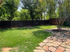 8926 Angleton Place Dallas, TX 75243 - Photo 2 of 19 a view of a backyard