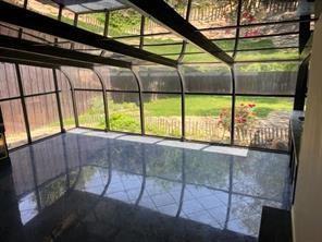 8926 Angleton Place Dallas, TX 75243 - Photo 8 of 19 a view of an outdoor space and a balcony