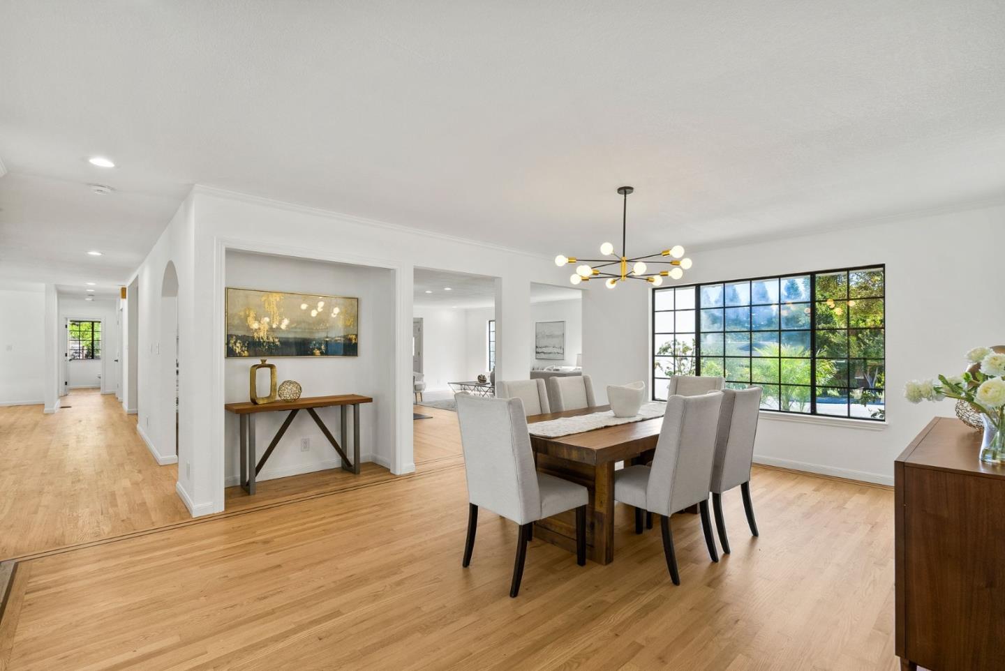 1475 Oak Rim Drive Hillsborough, CA 94010 - Photo 14 of 72 a view of a dining room with furniture window and wooden floor