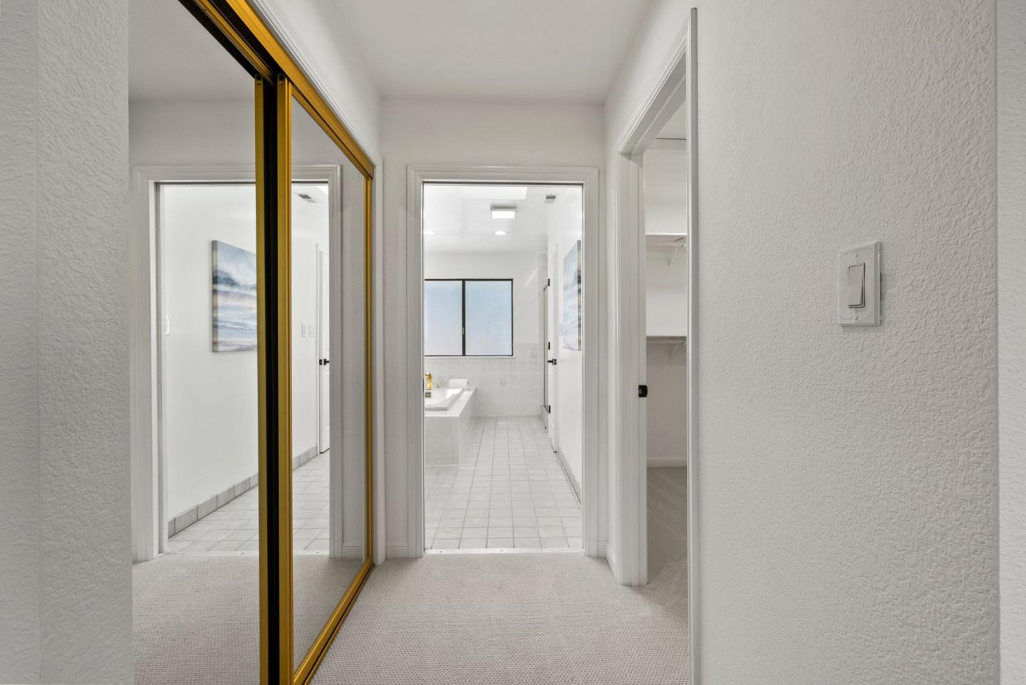 1475 Oak Rim Drive Hillsborough, CA 94010 - Photo 48 of 72 a view of a bathroom from a hallway