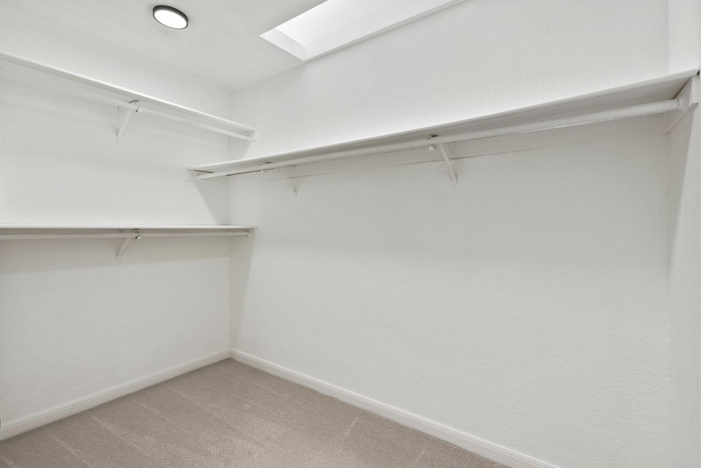 1475 Oak Rim Drive Hillsborough, CA 94010 - Photo 49 of 72 a view of an empty walk in closet