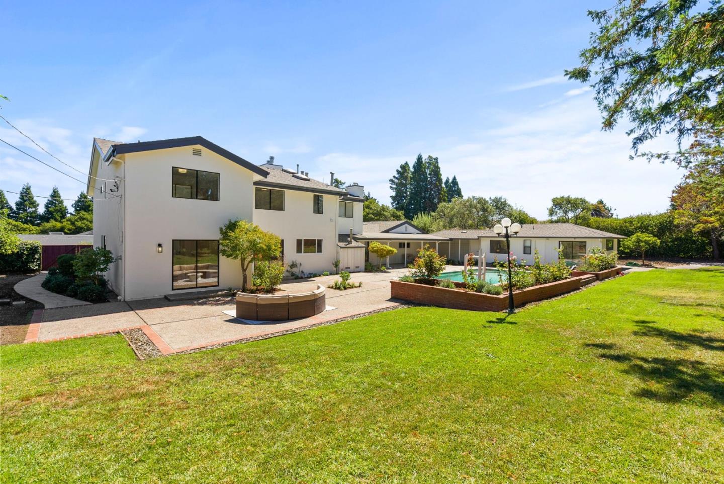 1475 Oak Rim Drive Hillsborough, CA 94010 - Photo 61 of 72 a view of a house with backyard and sitting area