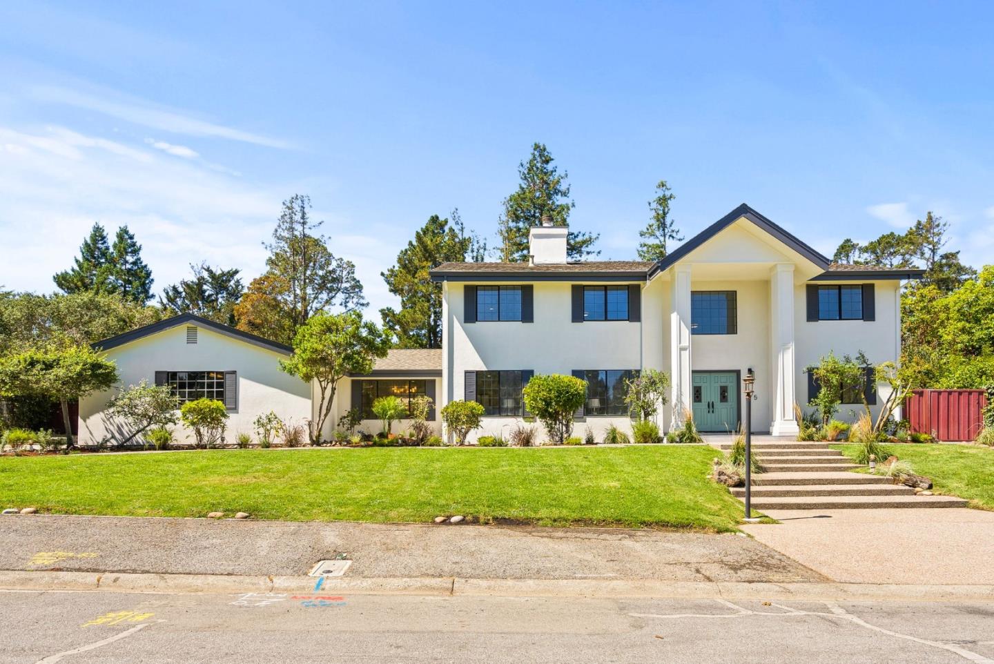 1475 Oak Rim Drive Hillsborough, CA 94010 - Photo 64 of 72 a front view of a house with a yard