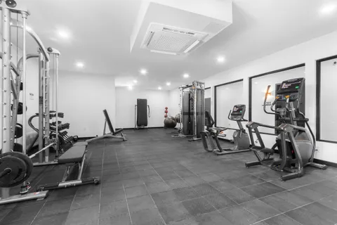 a view of a room with gym equipment