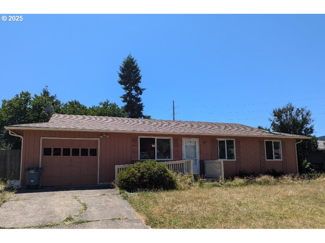 47696 West 1st Street Oakridge, OR 97463 - Photo 1 of 20 a view of a yard in front of a house