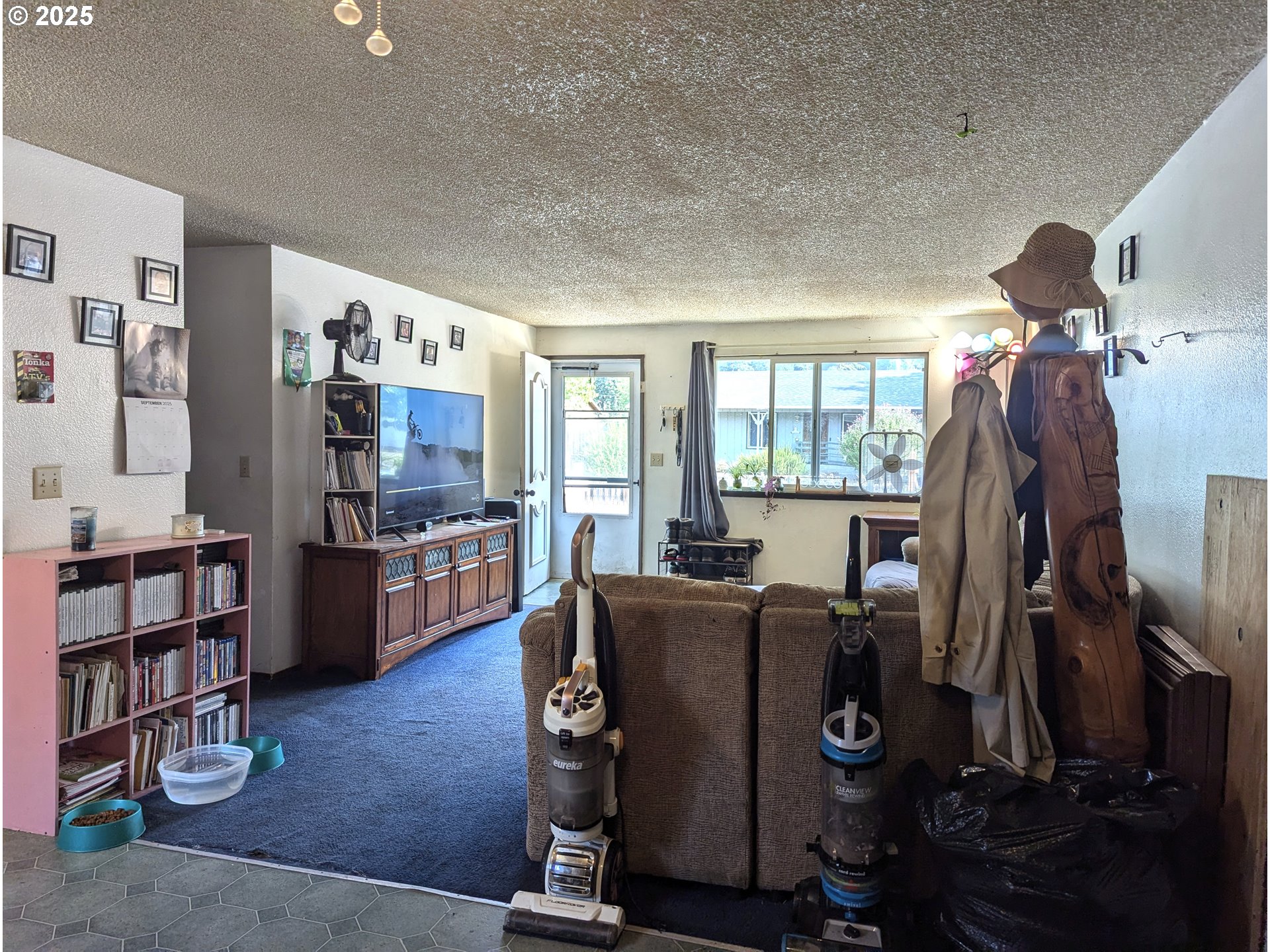 47696 West 1st Street Oakridge, OR 97463 - Photo 13 of 20 a view of a workspace with furniture and a window