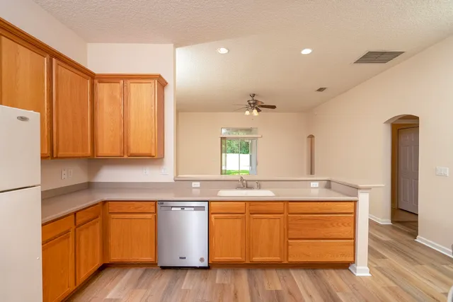 a view of a living room with a large window