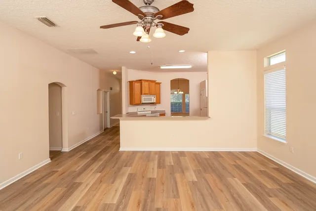 a view of a bathroom from a hallway