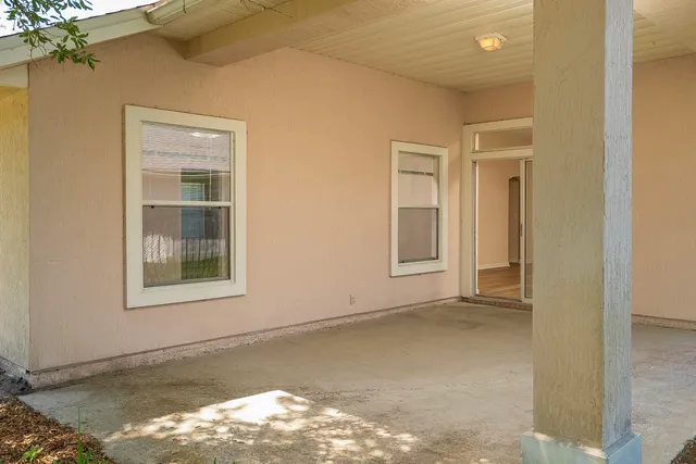 a view of a yard with an outdoor space