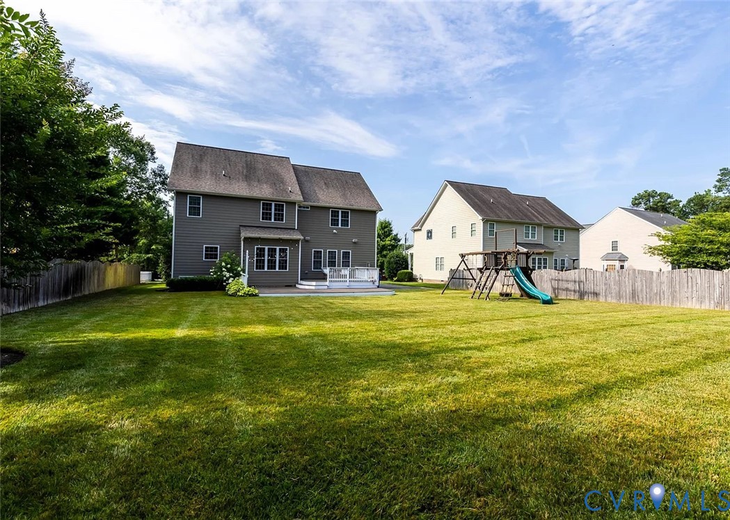 11902 Sunrise Road Henrico, VA 23233 - Photo 6 of 30 Expansive green yard featuring a privacy fence, re