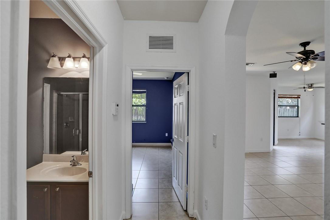 11331 Southwest 240 Lane Homestead, FL 33032 - Photo 26 of 92 a view of a hallway with a bathroom