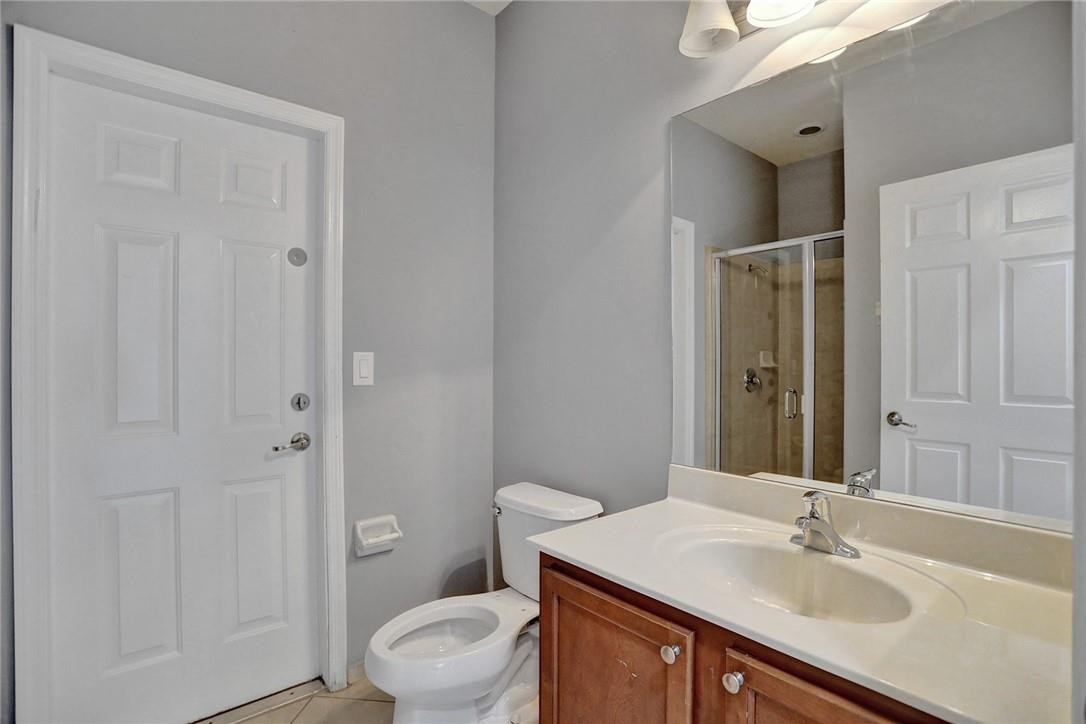 11331 Southwest 240 Lane Homestead, FL 33032 - Photo 28 of 92 a bathroom with a sink toilet and shower