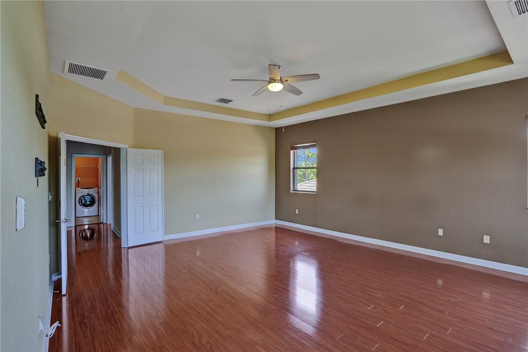 11331 Southwest 240 Lane Homestead, FL 33032 - Photo 41 of 92 wooden floor in an empty room with a window