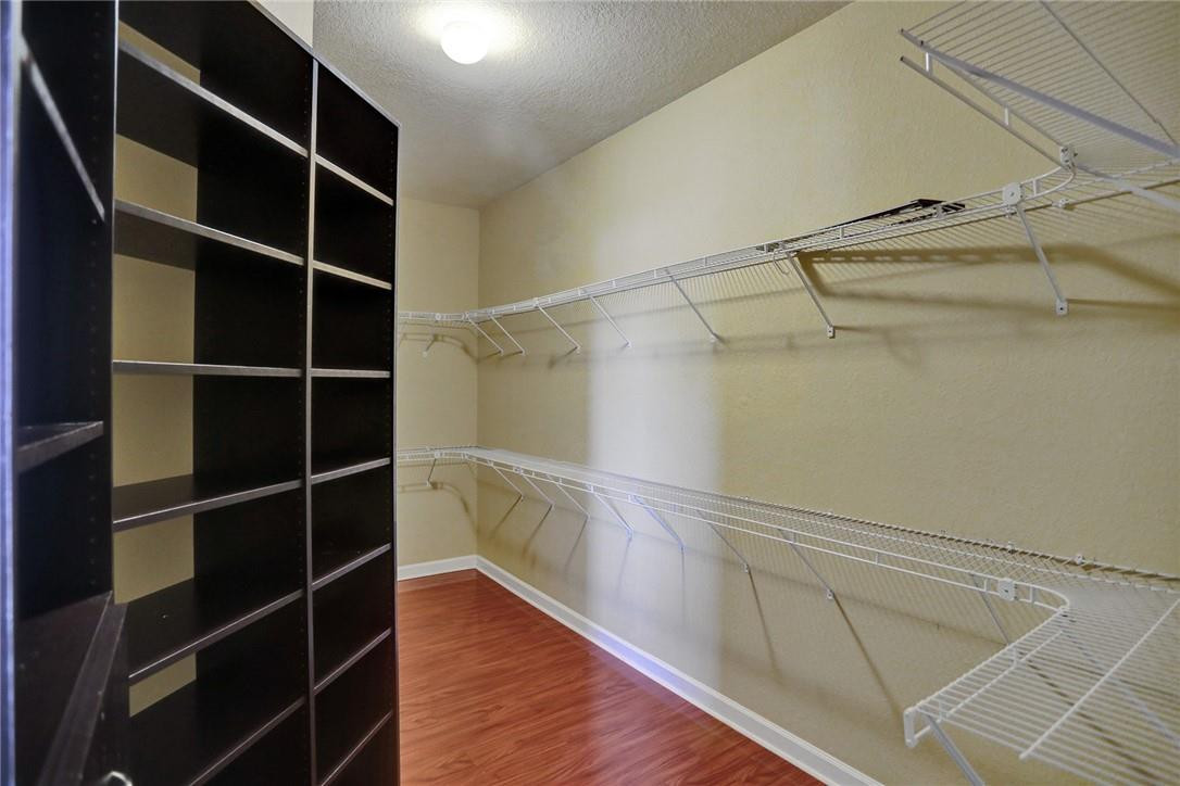 11331 Southwest 240 Lane Homestead, FL 33032 - Photo 42 of 92 a view of walk in closet with empty racks
