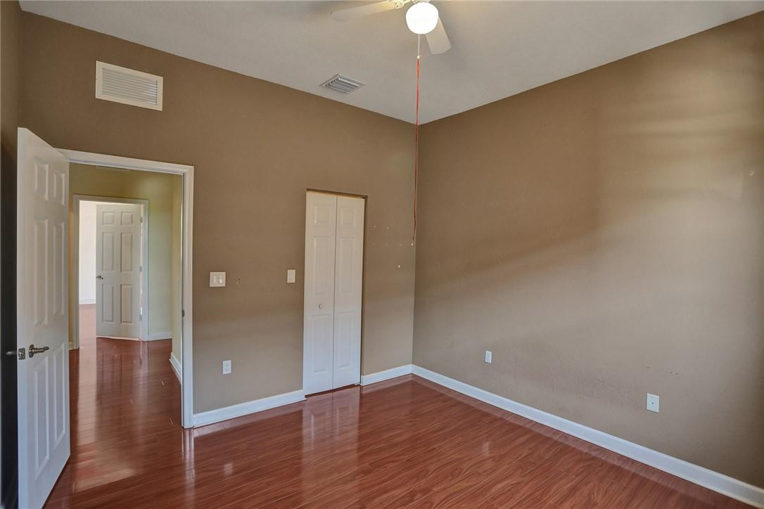 11331 Southwest 240 Lane Homestead, FL 33032 - Photo 61 of 92 wooden floor in an empty room
