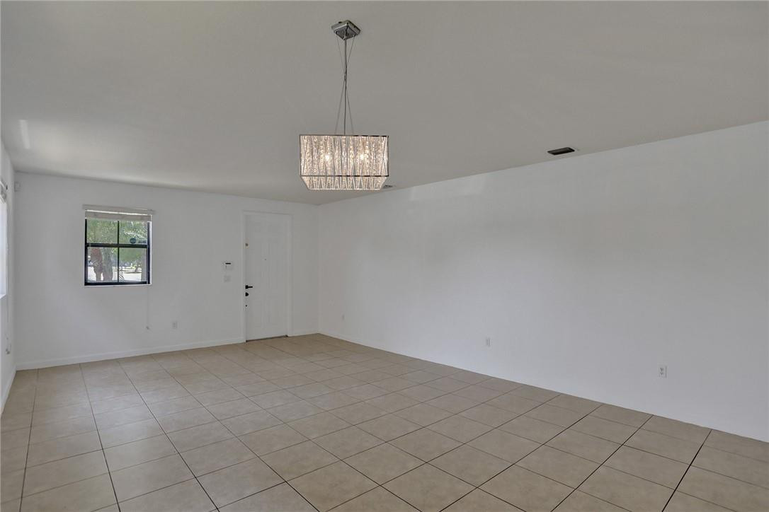 11331 Southwest 240 Lane Homestead, FL 33032 - Photo 10 of 92 a view of an empty room with a window