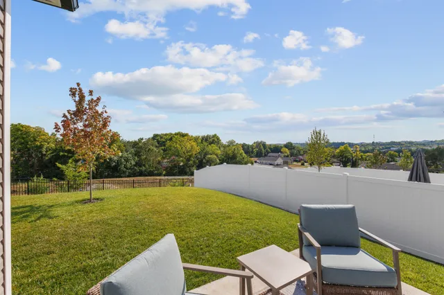 a view of a lake with a big yard