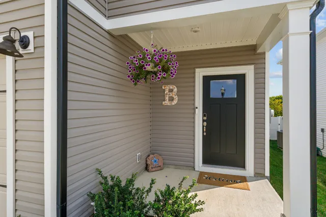 a front view of a house with a garage
