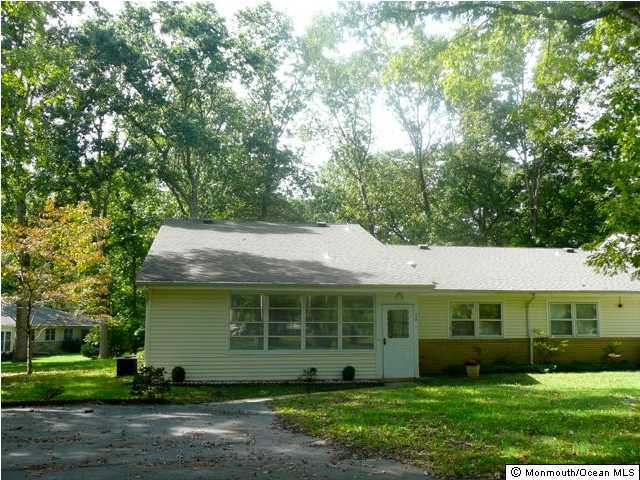 3 Meadowood Road, Unit A Jackson, NJ 08527 - Photo 1 of 3 a view of a house with a yard and plants