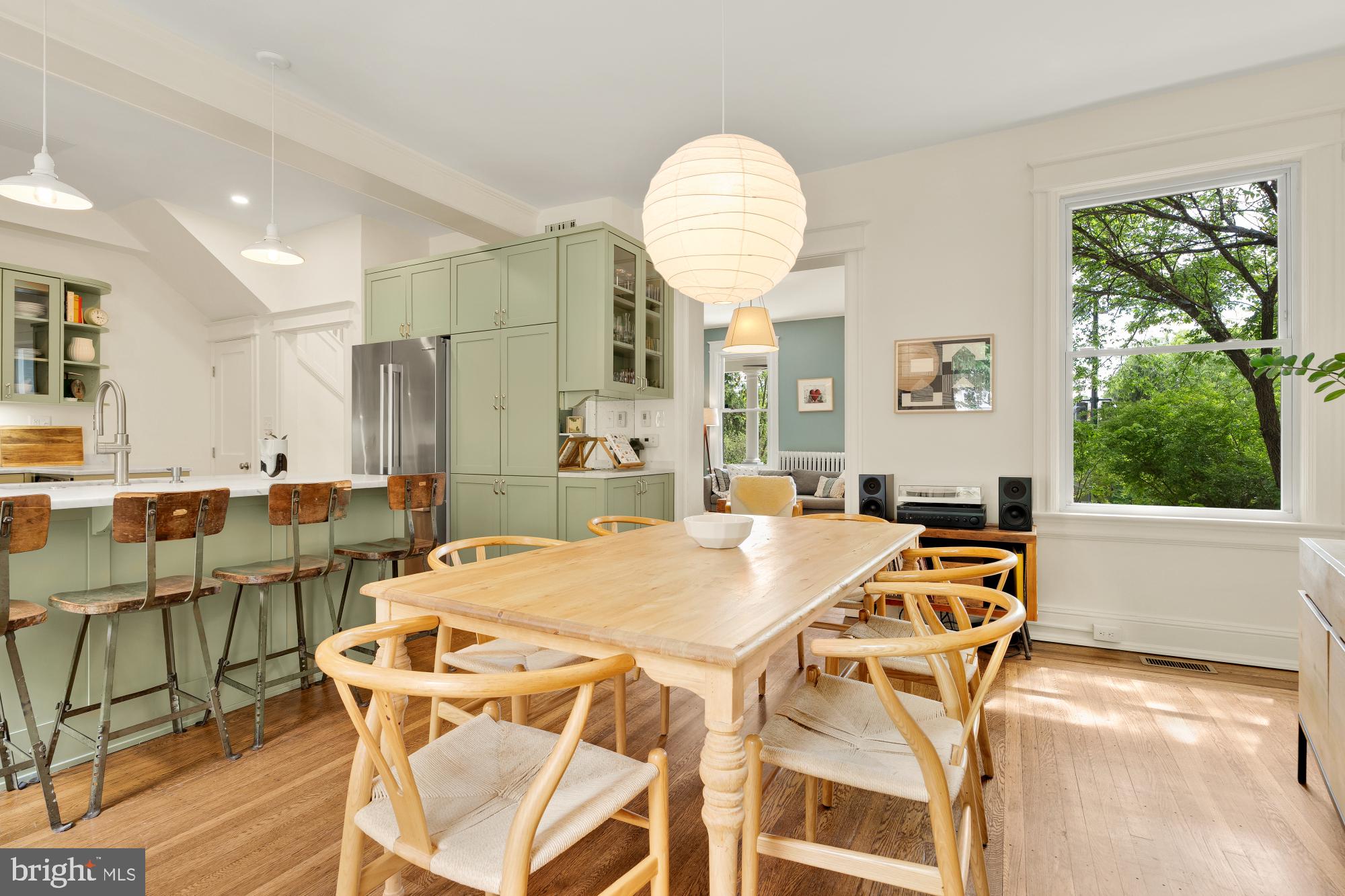 1929 Park Road Northwest Washington, DC 20010 - Photo 11 of 54 a view of a dining room with furniture window and wooden floor