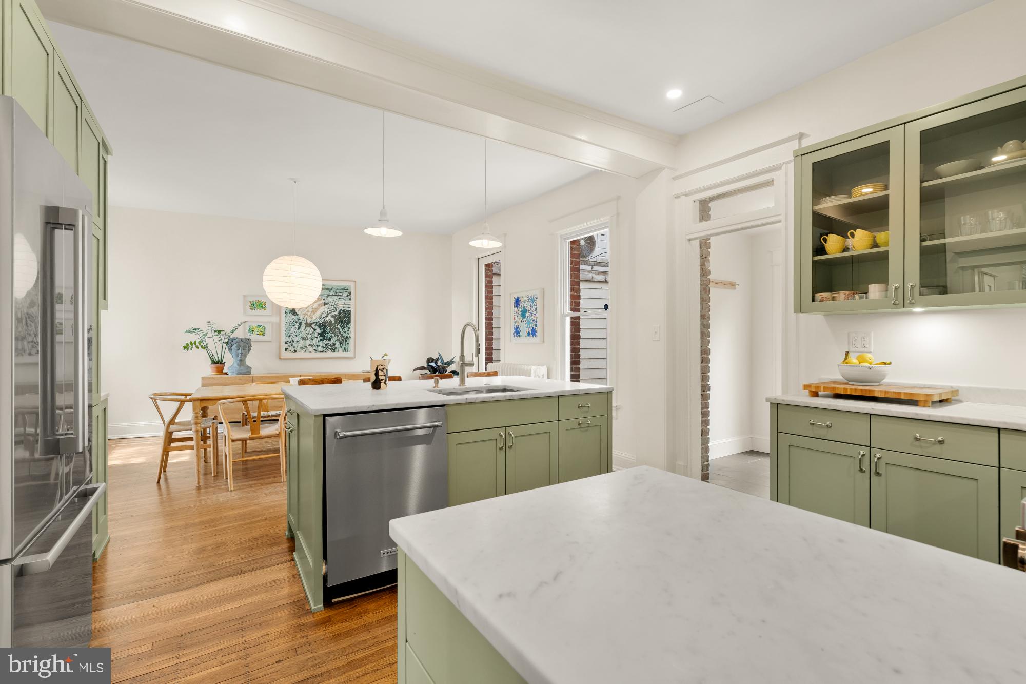 1929 Park Road Northwest Washington, DC 20010 - Photo 17 of 54 a kitchen with a sink cabinets and wooden floor