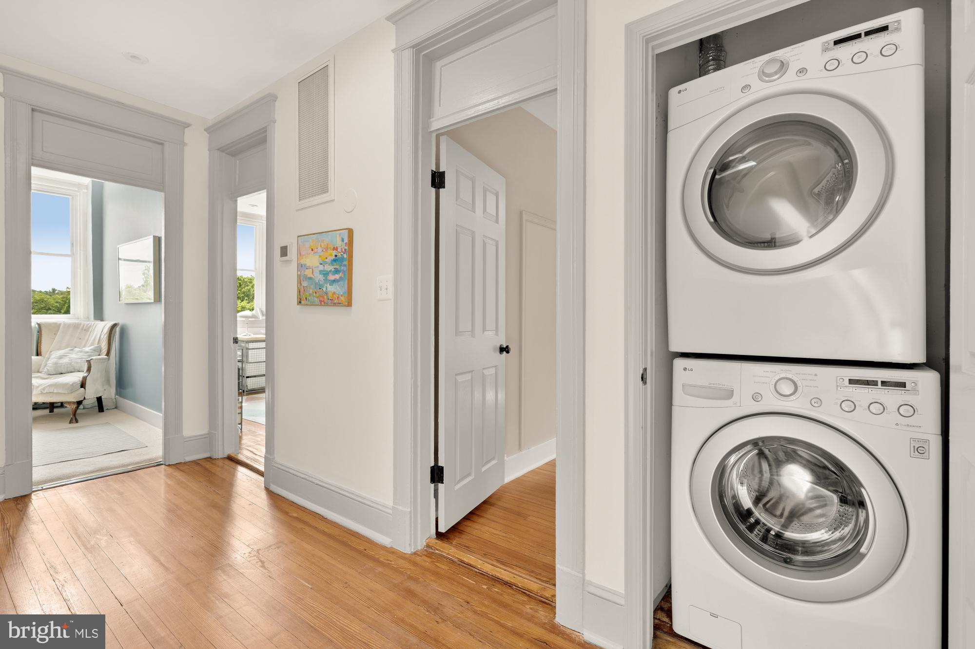 1929 Park Road Northwest Washington, DC 20010 - Photo 19 of 54 a view of a hallway with washer and dryer