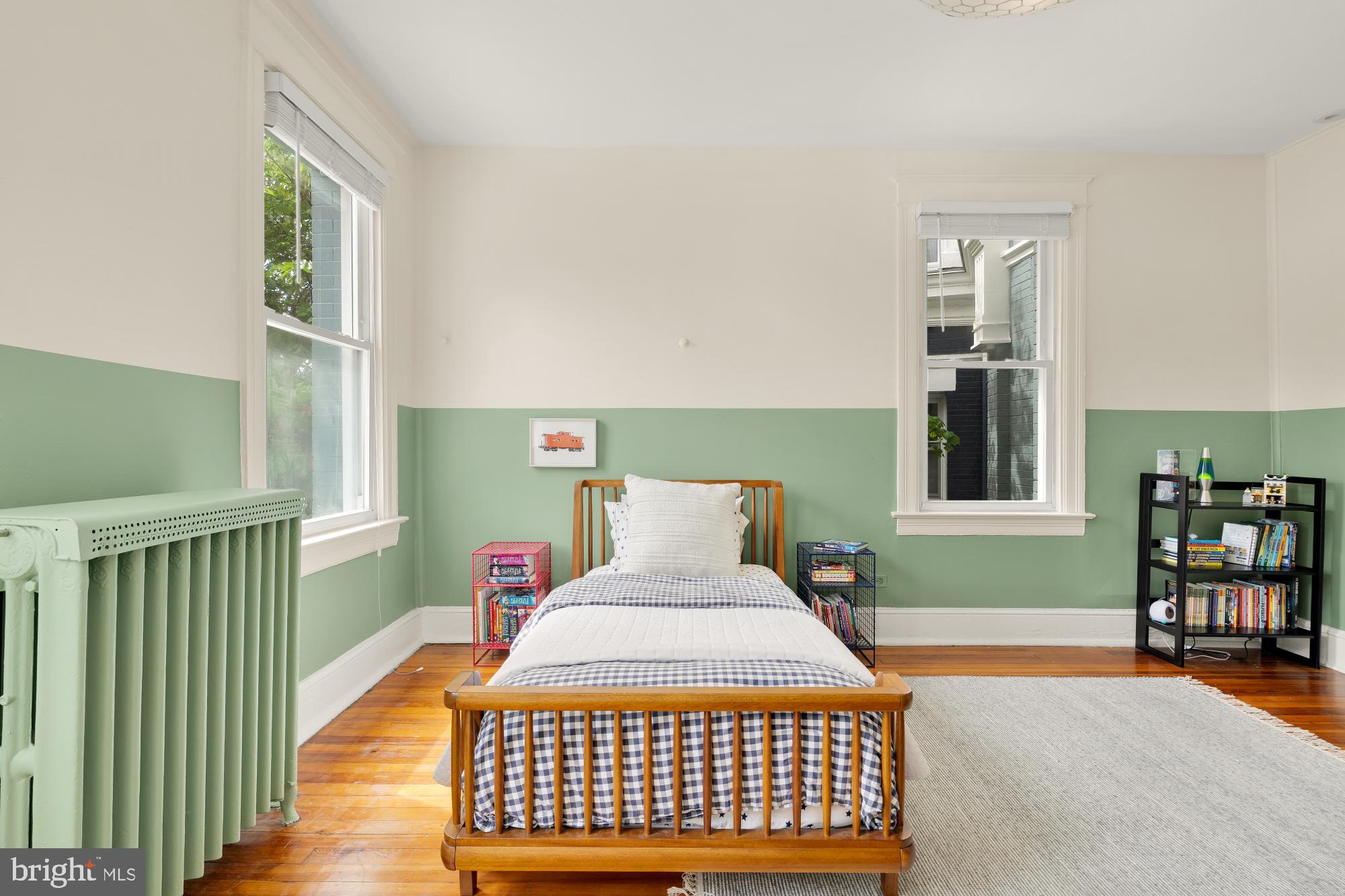1929 Park Road Northwest Washington, DC 20010 - Photo 21 of 54 a bedroom with a bed and window