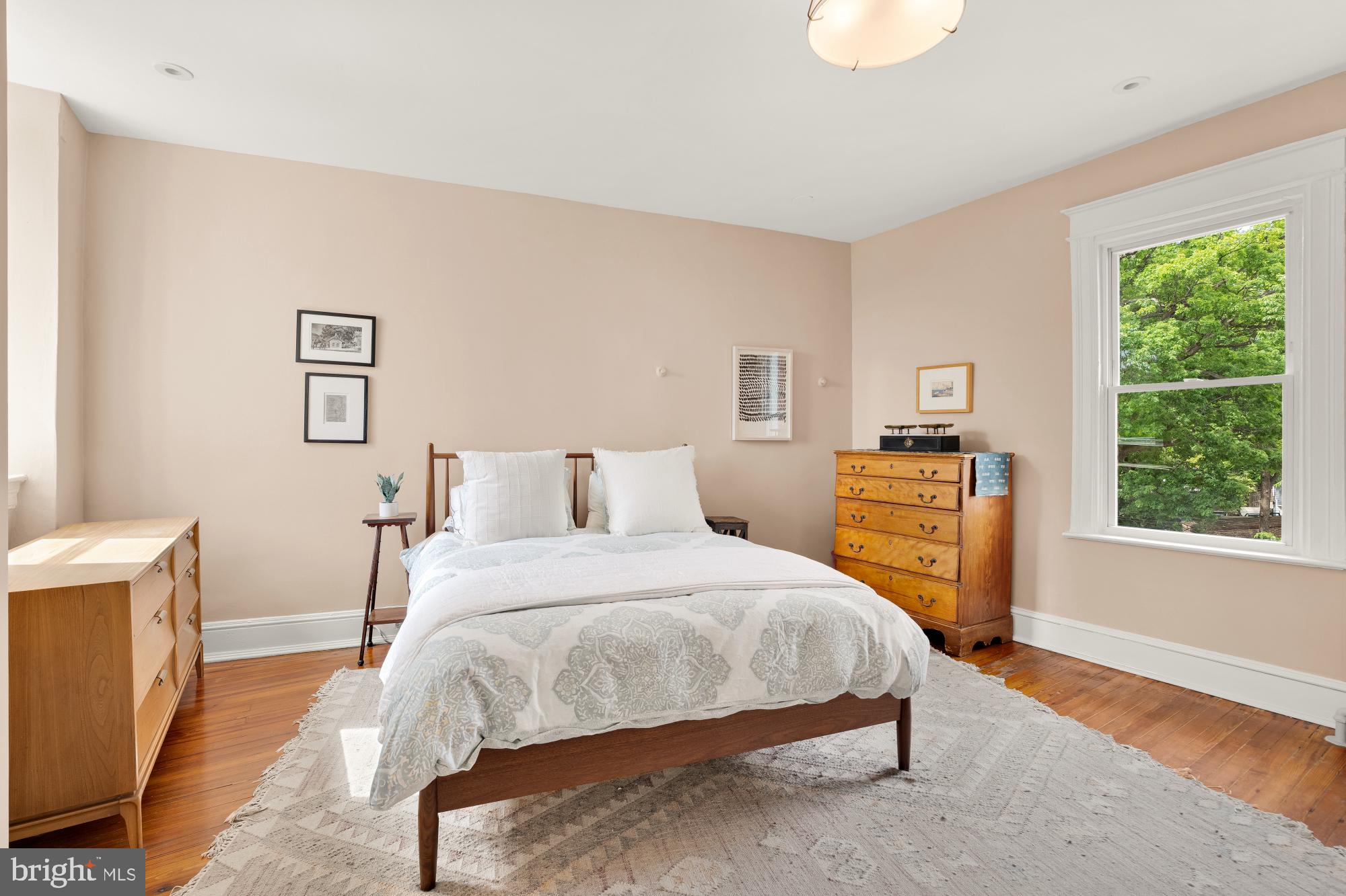 1929 Park Road Northwest Washington, DC 20010 - Photo 28 of 54 a bedroom with a bed and a window