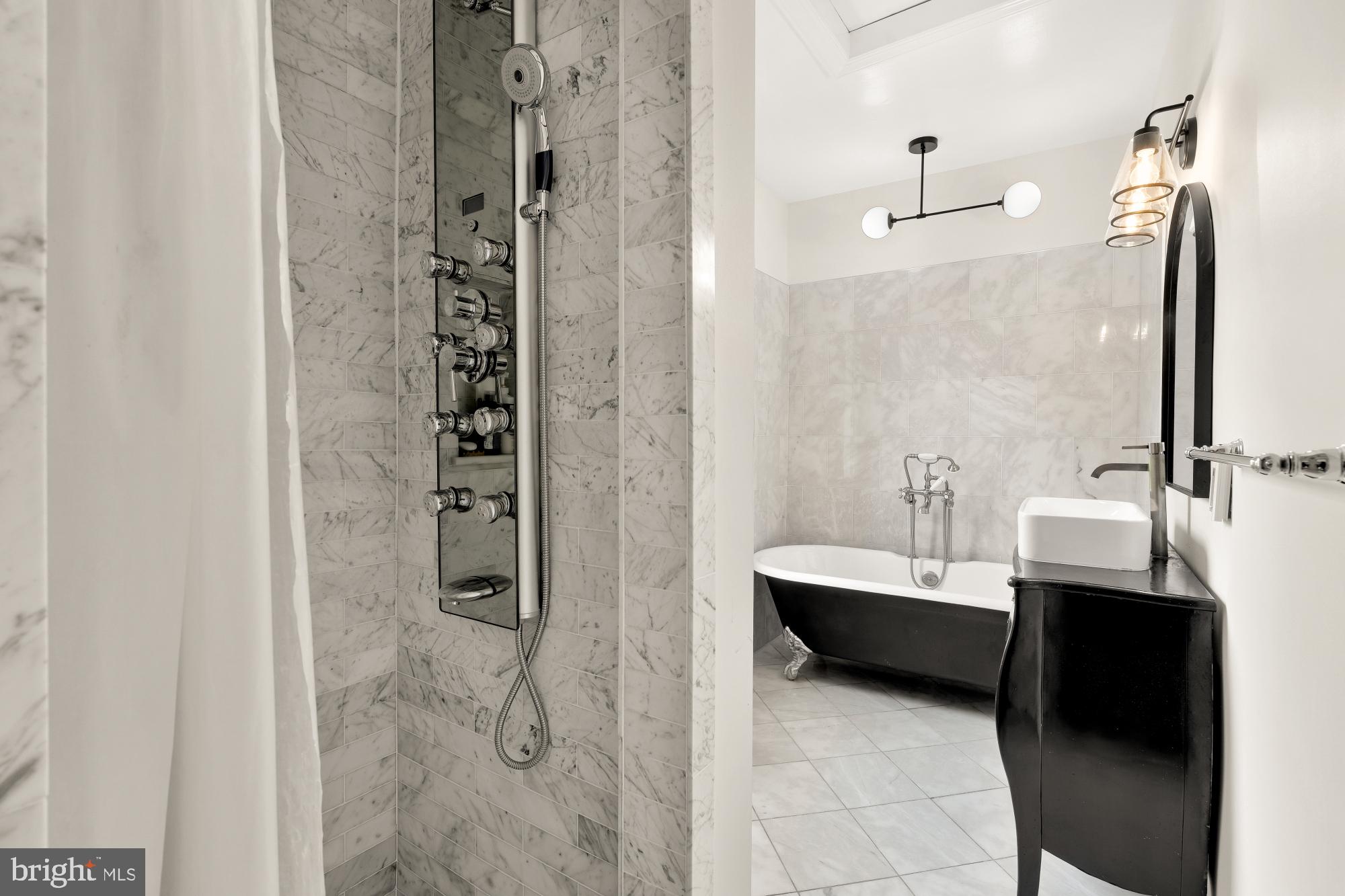 1929 Park Road Northwest Washington, DC 20010 - Photo 31 of 54 a en suite bathroom with a sink and a mirror