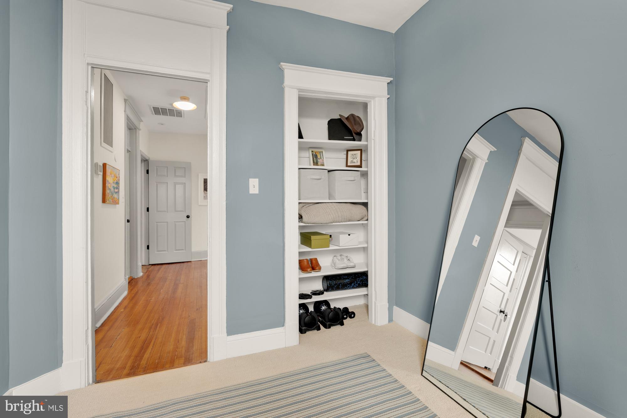 1929 Park Road Northwest Washington, DC 20010 - Photo 34 of 54 a view of a hallway with wooden floor and entryway