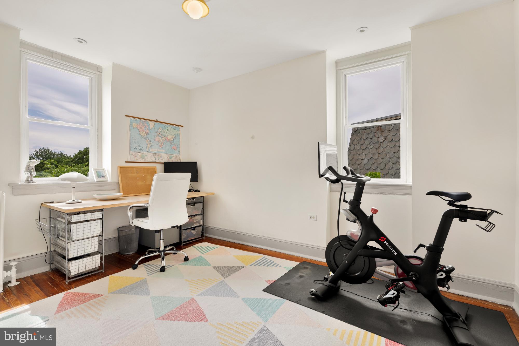 1929 Park Road Northwest Washington, DC 20010 - Photo 35 of 54 a view of a workspace with furniture and a window