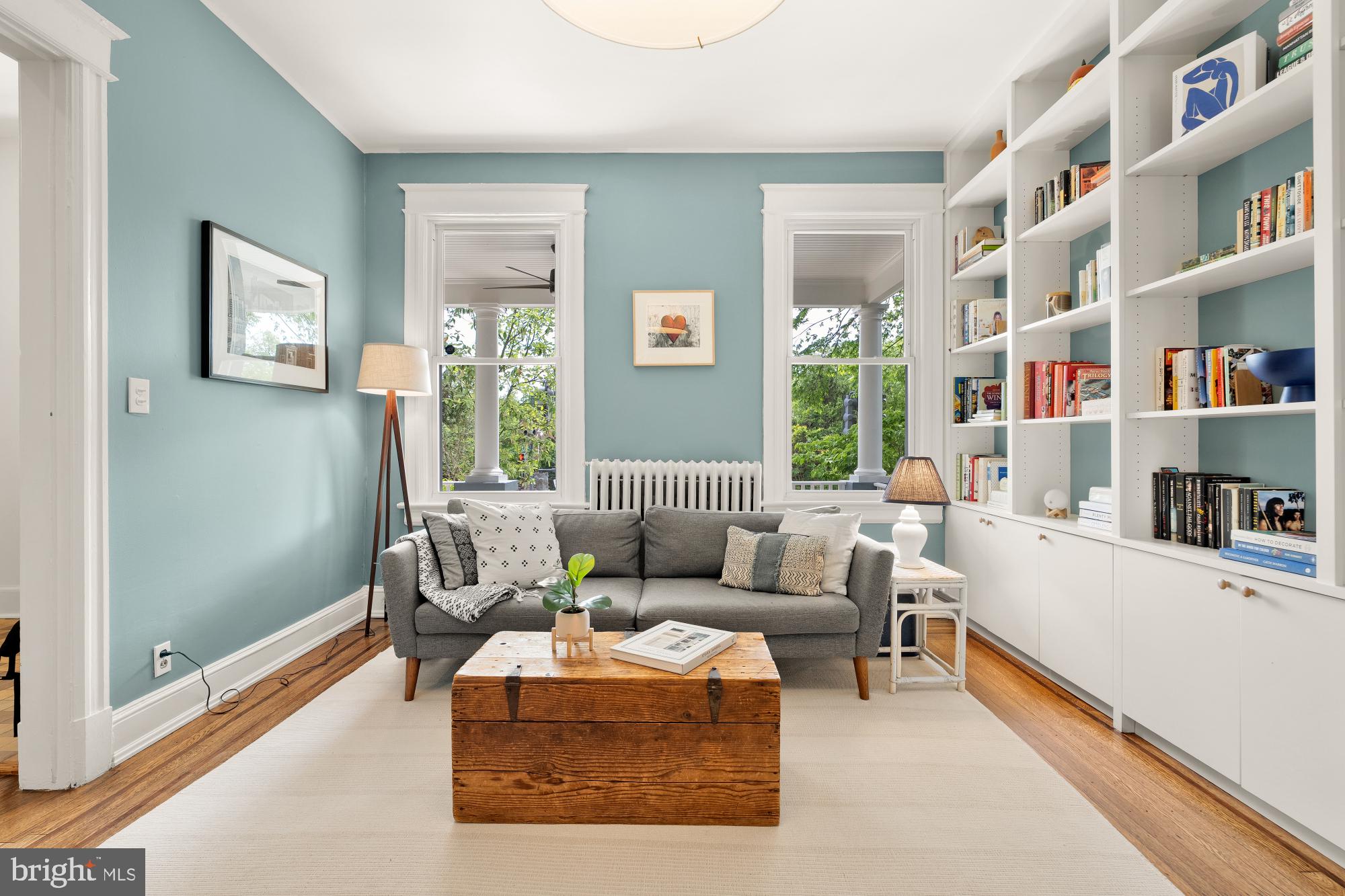 1929 Park Road Northwest Washington, DC 20010 - Photo 6 of 54 a living room with furniture and a book shelf