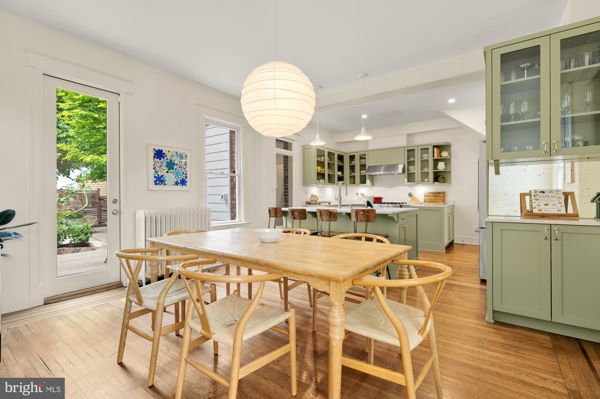 1929 Park Road Northwest Washington, DC 20010 - Photo 10 of 54 a dining area with furniture and a large window