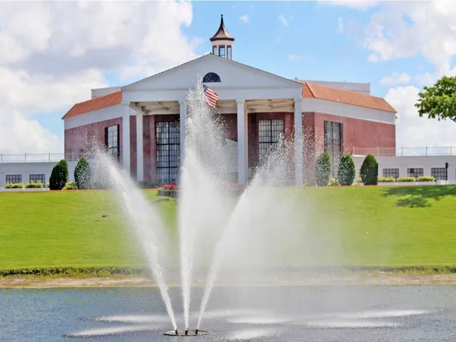 a view of a building with a yard