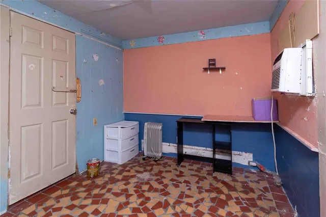 a room that has a couch and a chair in it