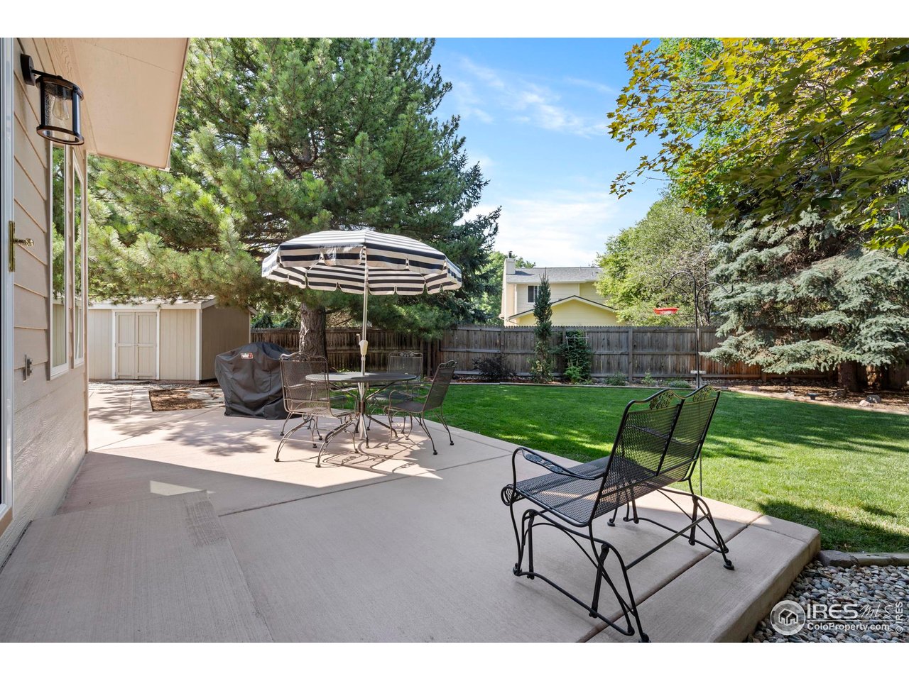 1213 Centennial Road Fort Collins, CO 80525 - Photo 21 of 29 Mature landscaping in the backyard - every detail is taken care of!