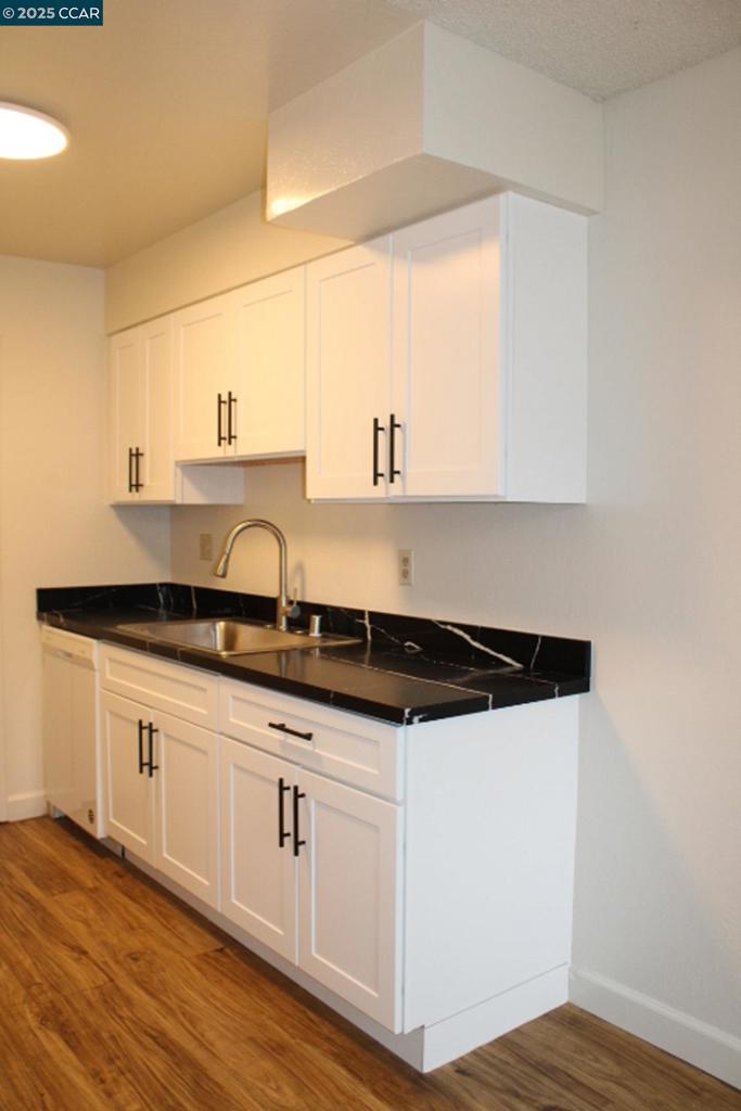 3430 San Pablo Dam Road San Pablo, CA 94803 - Photo 9 of 21 a kitchen with granite countertop a sink and a stove
