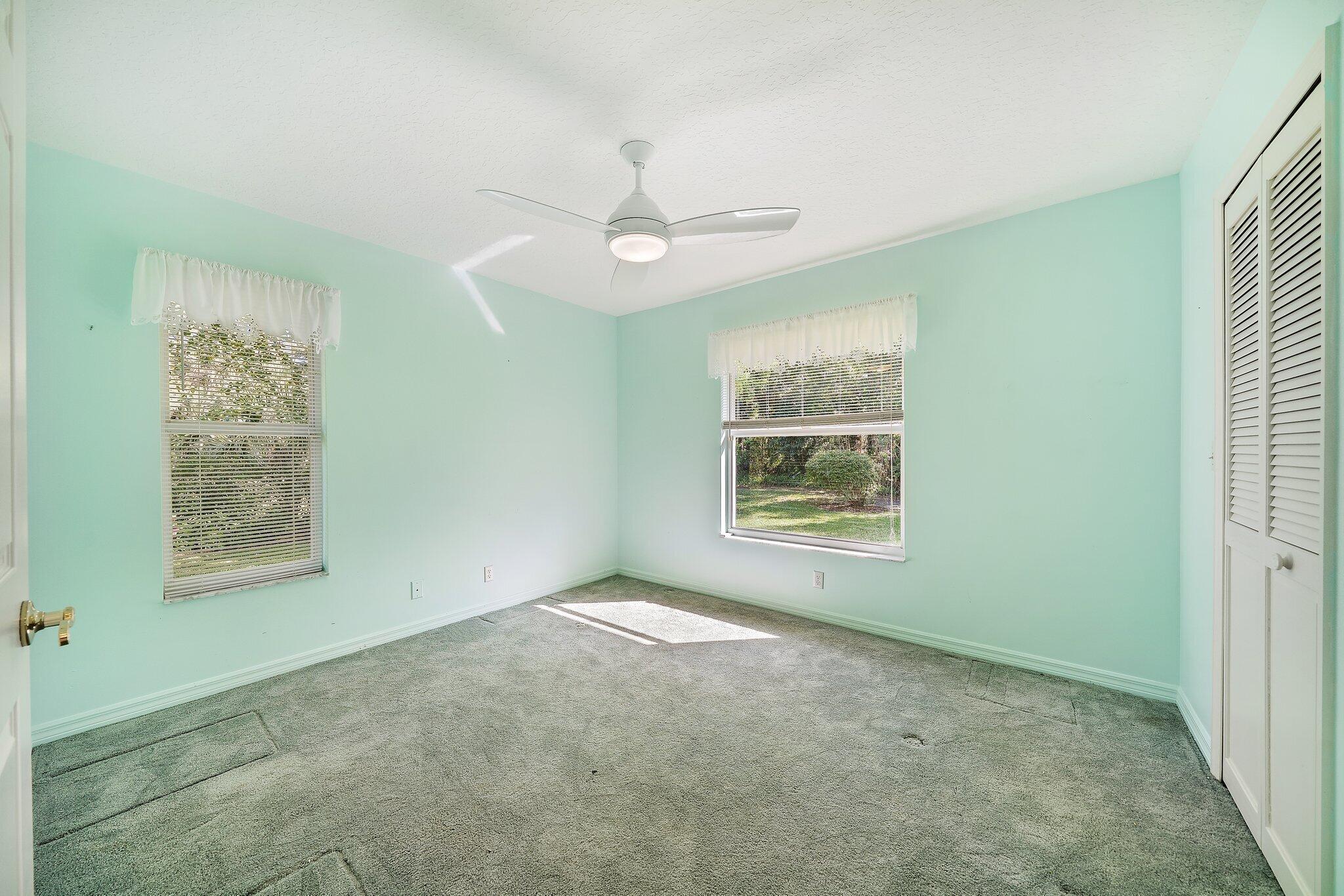 10424 Sandy Run Road Jupiter, FL 33478 - Photo 24 of 52 a view of an empty room with a window