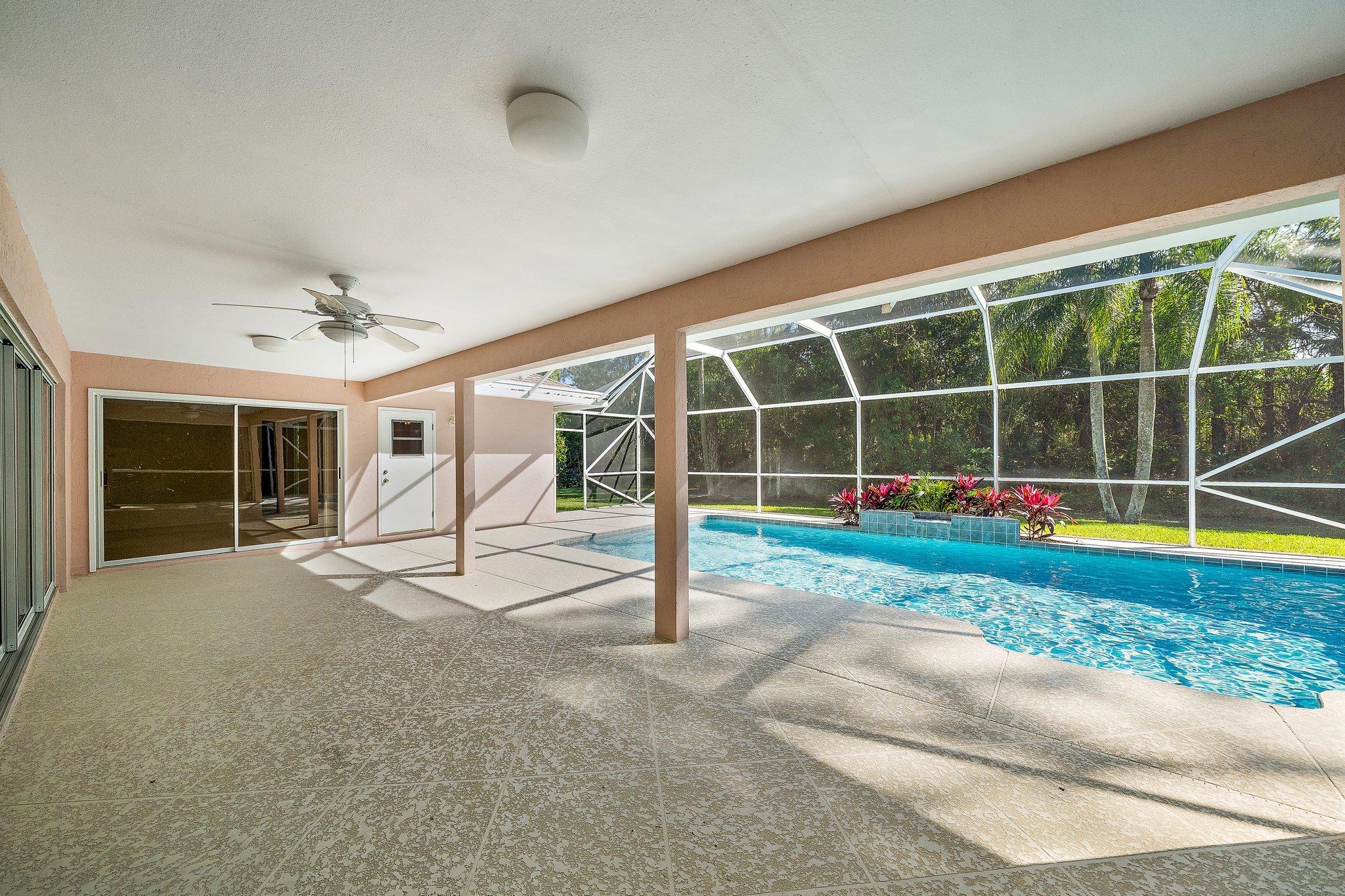 10424 Sandy Run Road Jupiter, FL 33478 - Photo 30 of 52 a view of outdoor space and porch
