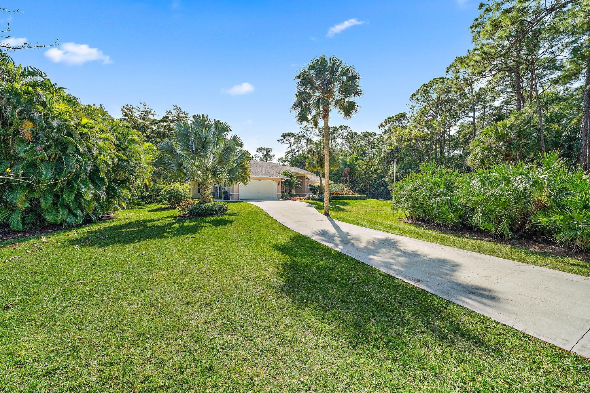 10424 Sandy Run Road Jupiter, FL 33478 - Photo 38 of 52 a view of a backyard