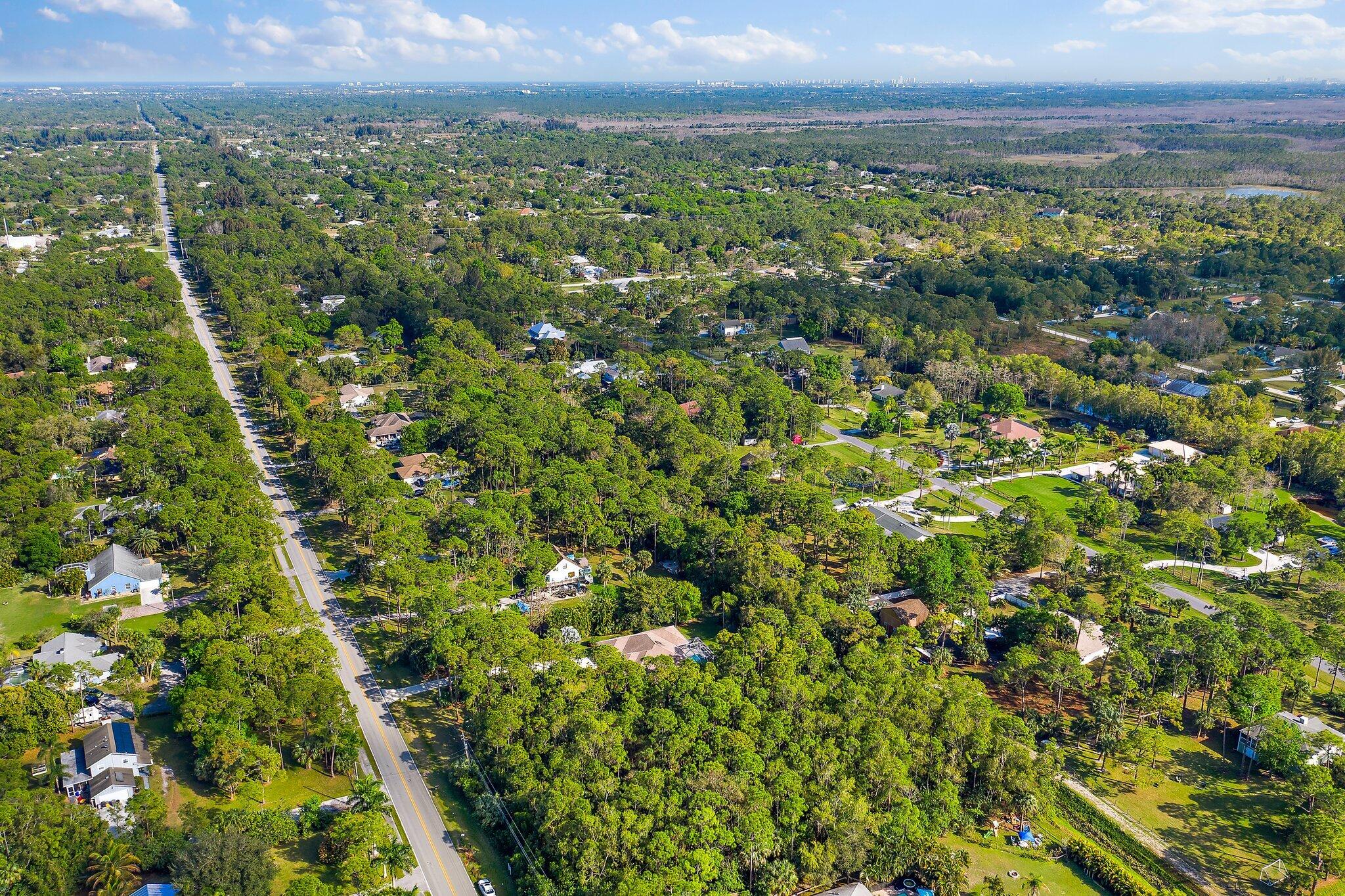 10424 Sandy Run Road Jupiter, FL 33478 - Photo 49 of 52 a view of a green field
