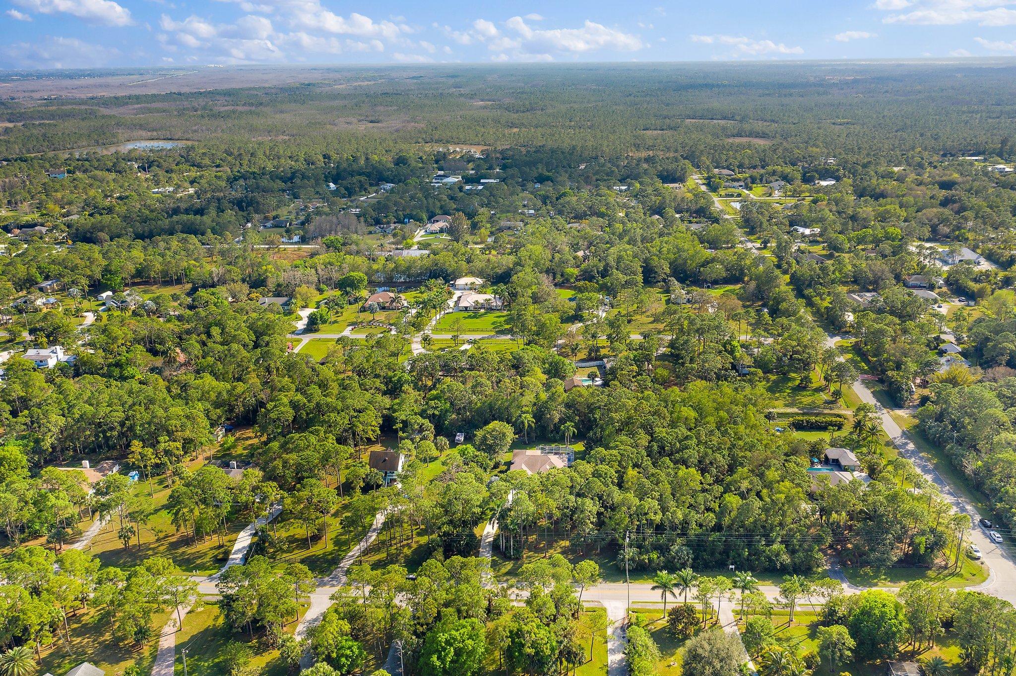 10424 Sandy Run Road Jupiter, FL 33478 - Photo 51 of 52 a view of a city with an ocean