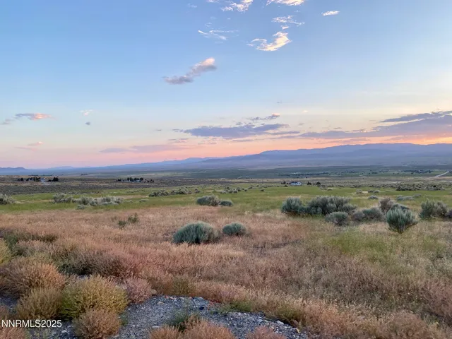 a view of lake with mountain