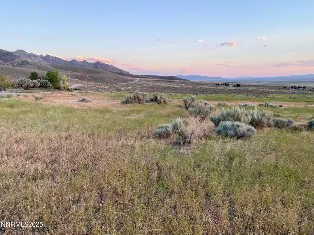 a view of an outdoor space and mountains